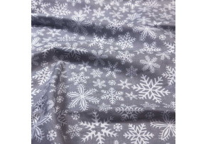 Tkanina bawełniana świąteczna wzór białe śnieżynki na szarym tle Tkanina bawełniana świąteczna wzór białe śnieżynki na szarym tle