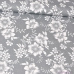 Tkanina bawełniana wzór białe koronkowe kwiaty na szarym tle
